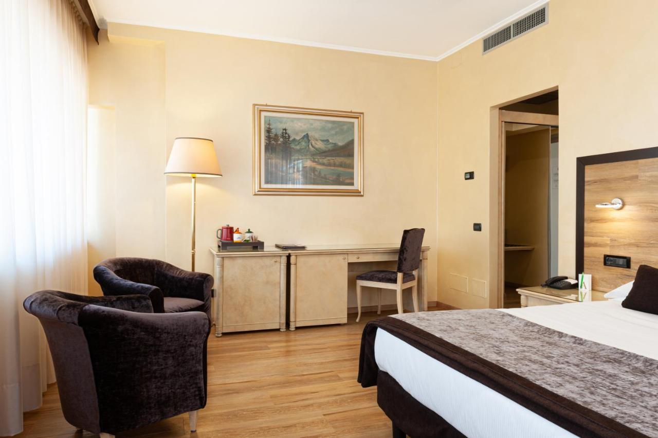 Augustus Hotel Biella Bagian luar foto